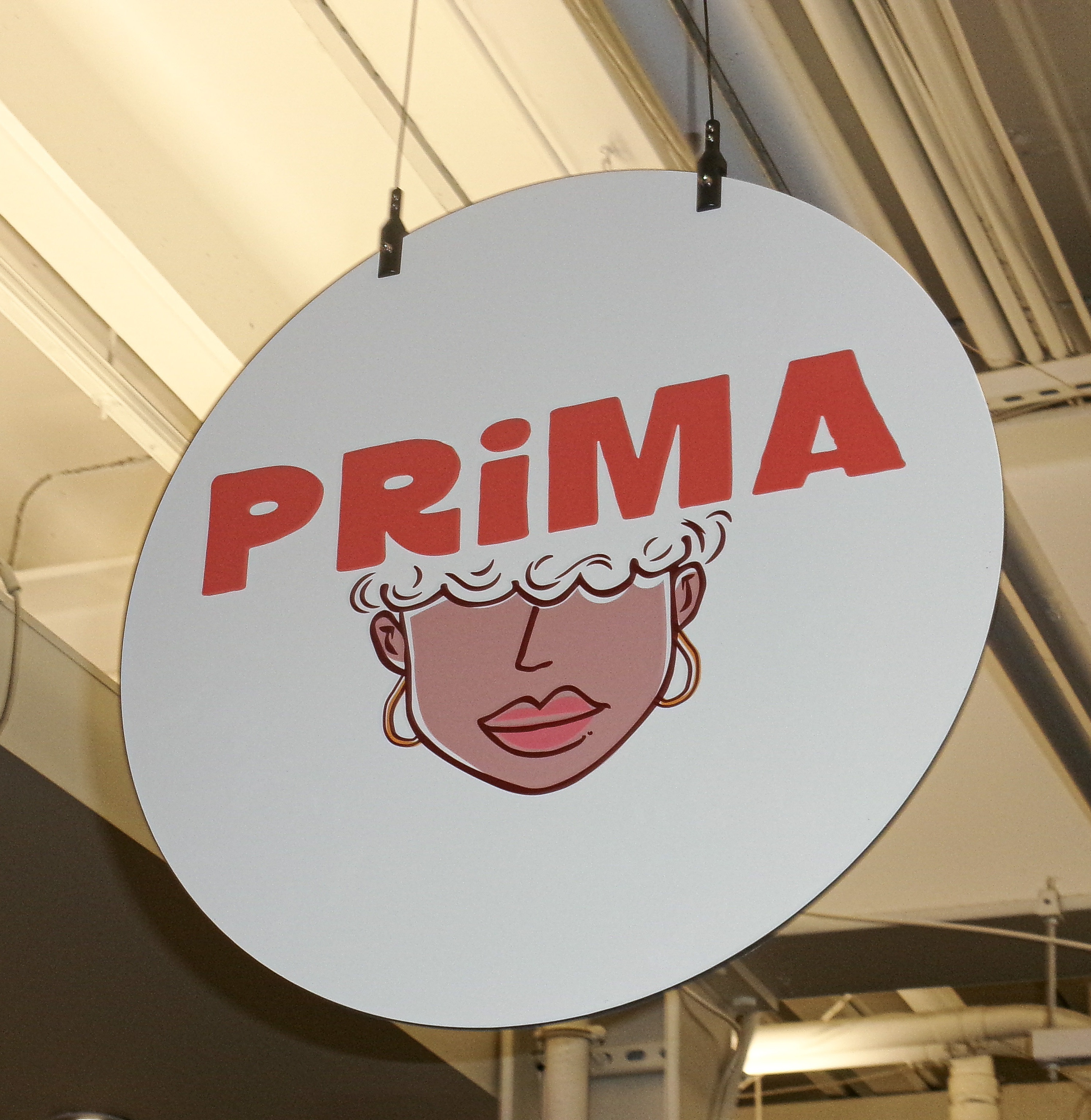The Prima sign hanging at Union Market